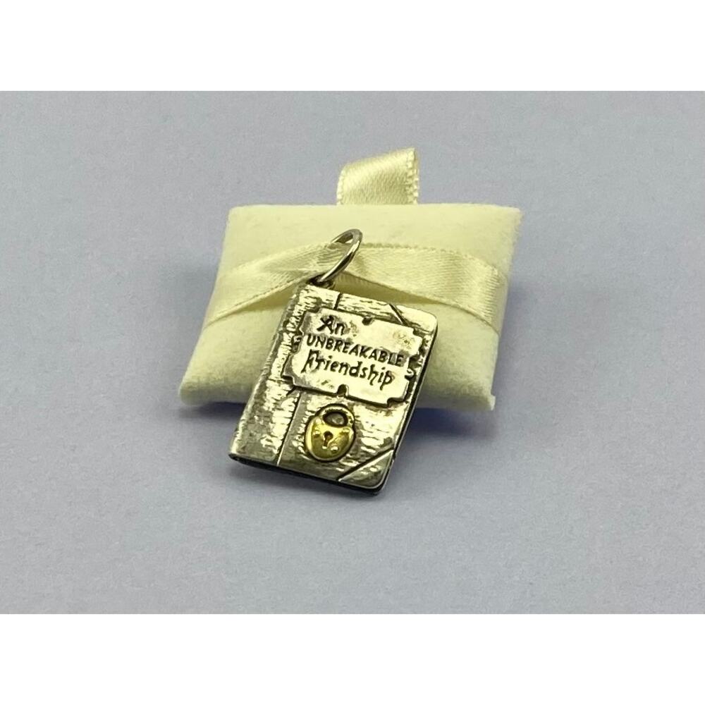 Waxing poetic Sterling silver friendship charm